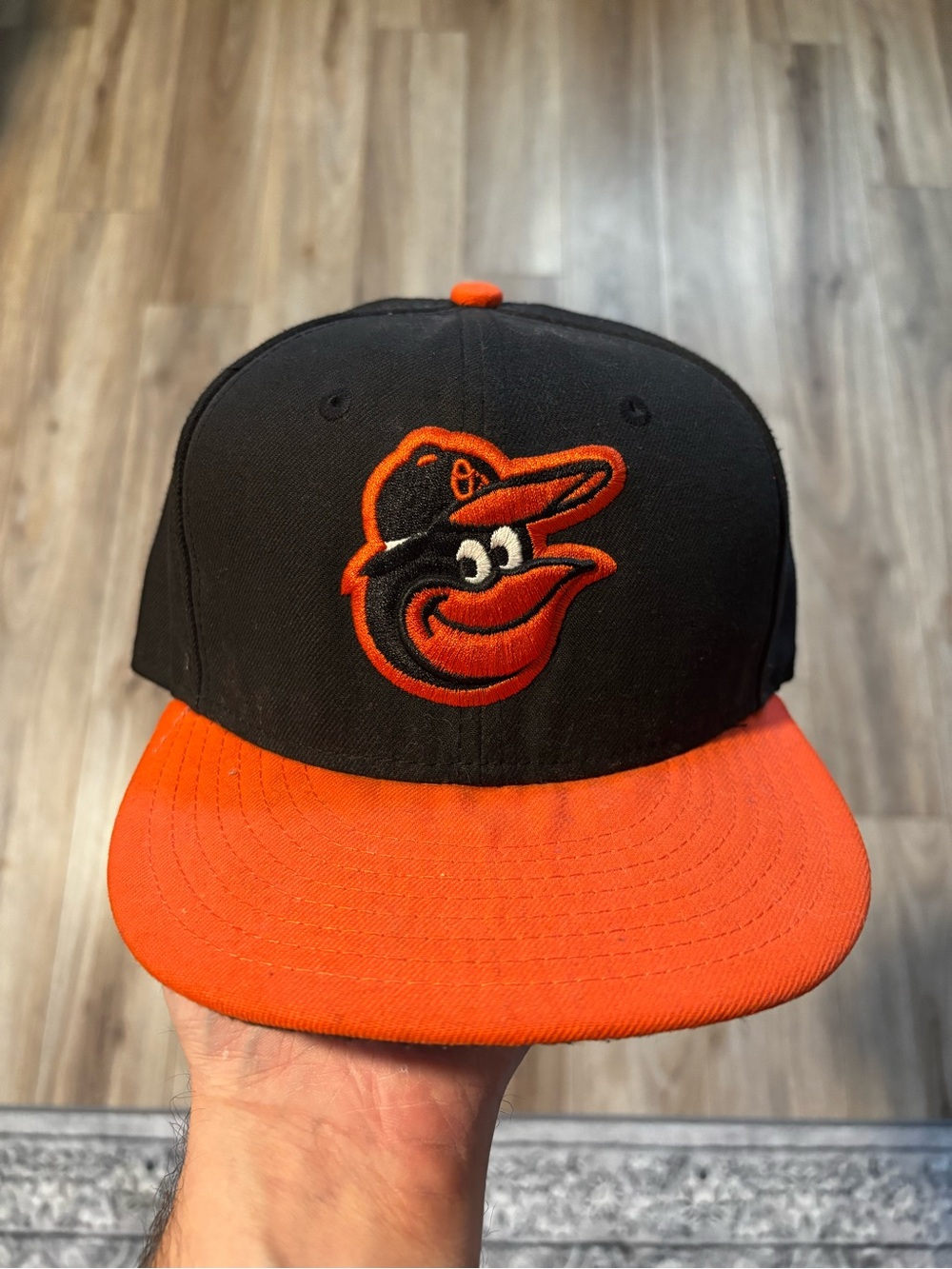 Size 7 New Era Baltimore Orioles Fitted Hat